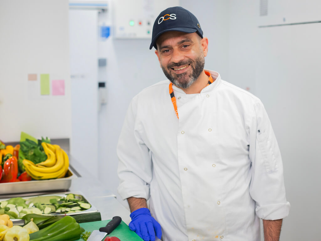 OCS Chef in kitchen Reducing Food Waste