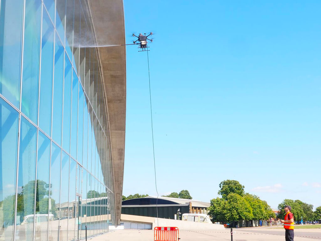 OCS drone cleaning office windows