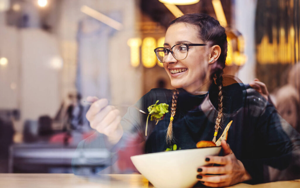 Girl eating salad