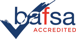 Logo of BAFSA Accredited. The design features a stylized blue check mark that intersects the lowercase blue letters bafsa, with the f in red. The word ACCREDITED is written in red below.