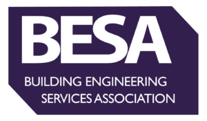 Logo of the Building Engineering Services Association (BESA), featuring bold white letters on a dark purple geometric background.