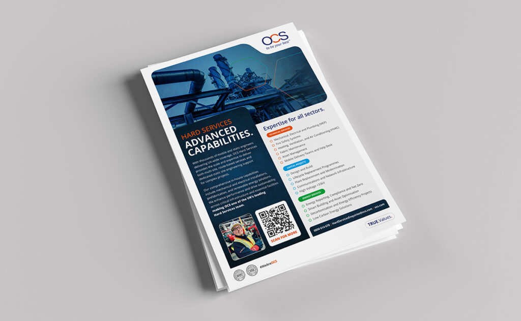 A stack of brochures on a gray surface. The top brochure features industrial imagery, a logo reading OCS, and text about Hard Services and Advanced Capabilities. Includes a QR code, a checklist of services, and contact information.