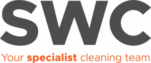 Large grey letters SWC above the phrase Your specialist cleaning team in smaller text, with specialist highlighted in orange and the rest in grey, on a light background.