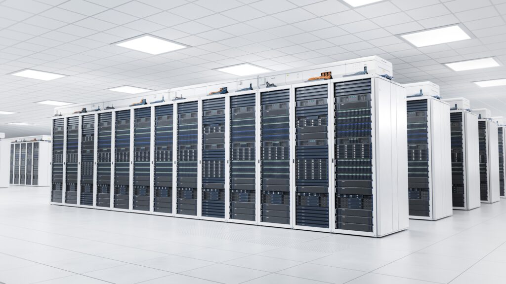 Rows of server racks in a bright, modern data center with white walls, ceiling, and floor; the racks are filled with networking equipment and cables, creating a clean and organized environment.
