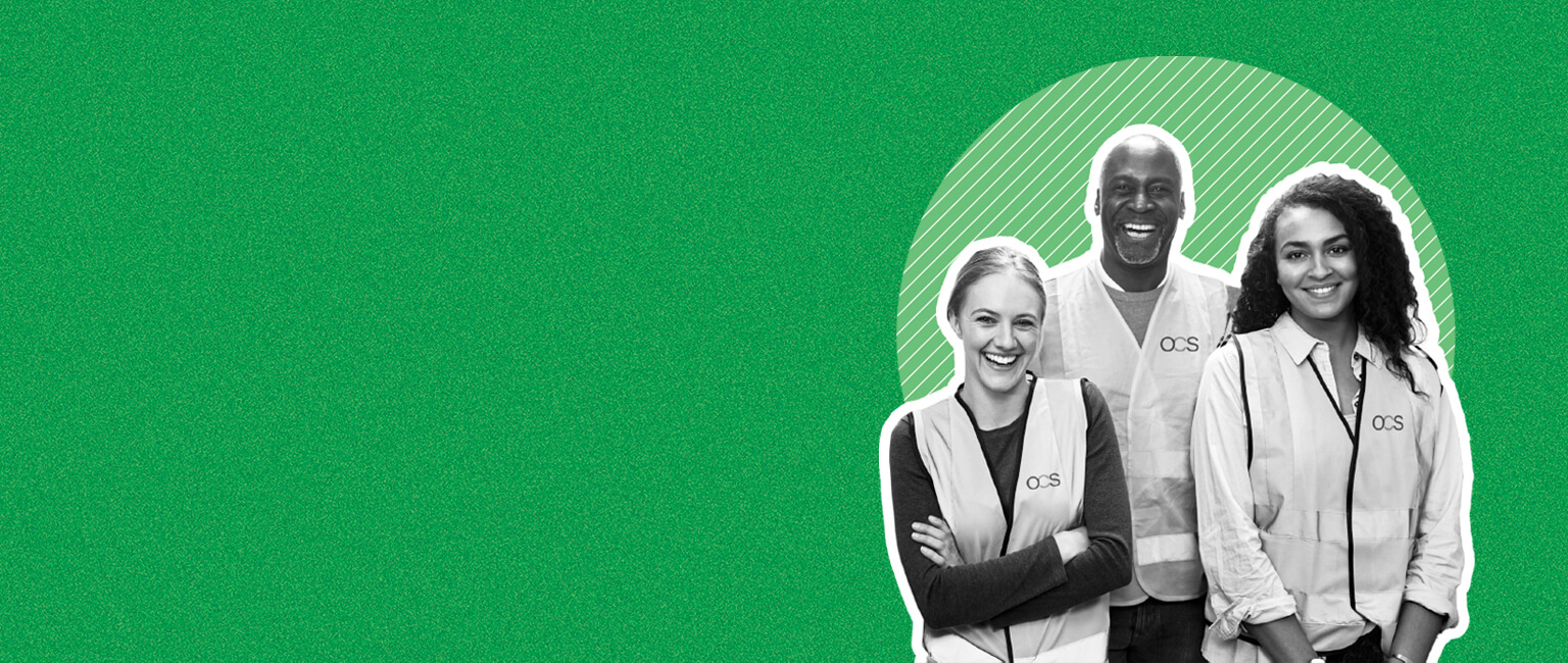 Three smiling volunteers wearing vests with “CVS” on them stand together on the right side of a green background with plenty of empty space on the left.