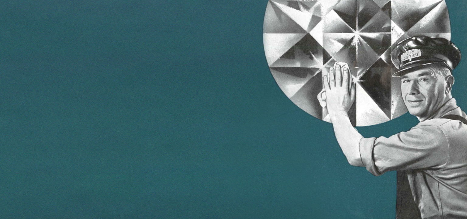 A man in a uniform and cap touches a large, faceted, reflective sphere against a teal background.