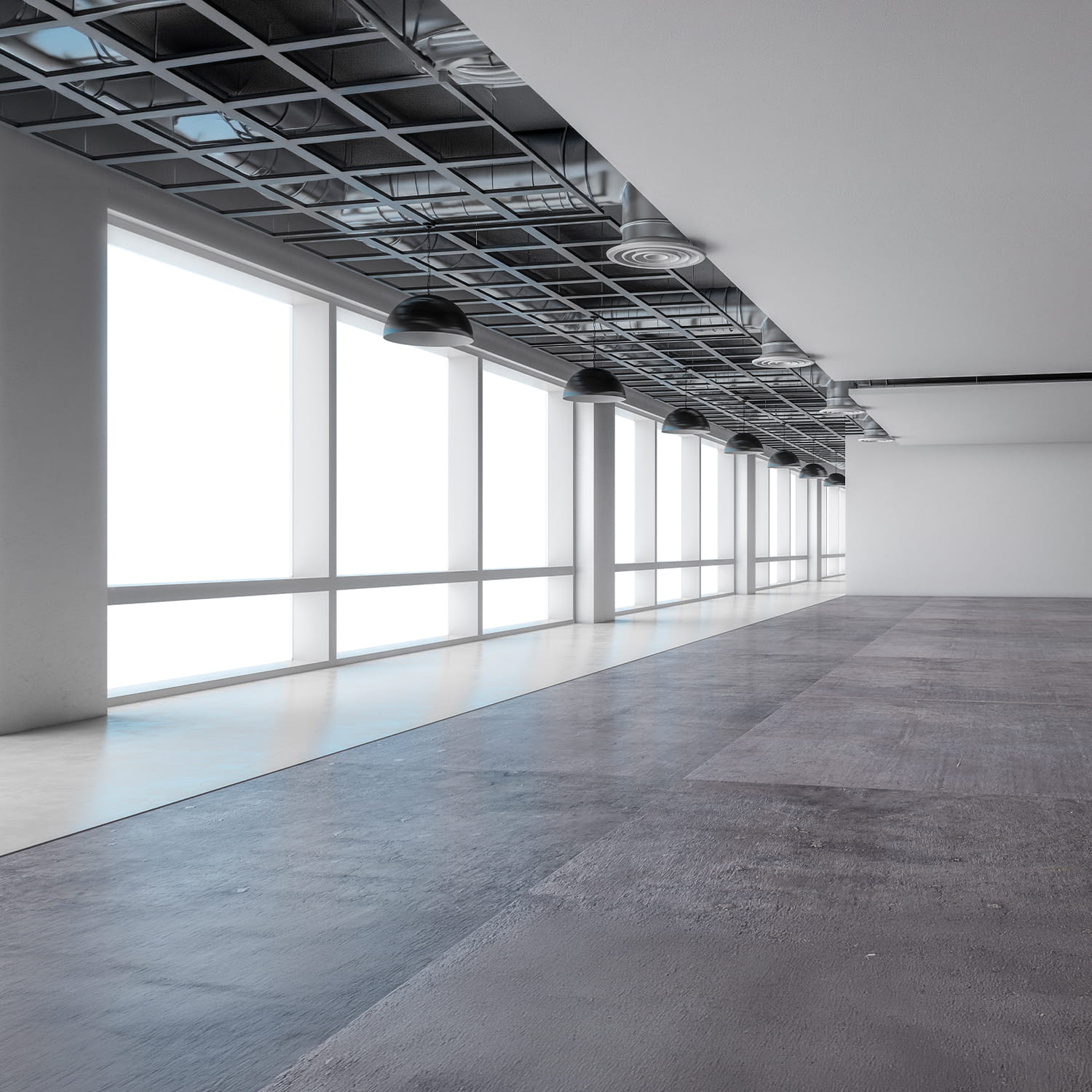 Spacious, empty room with large floor-to-ceiling windows, polished concrete floor, and a modern reflective ceiling with black hanging lights. Bright natural light fills the minimalist interior.